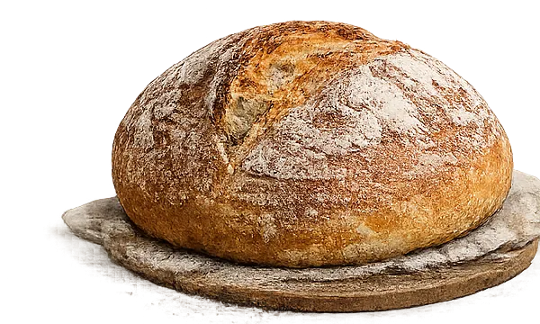 A round sourdough loaf on a slate board